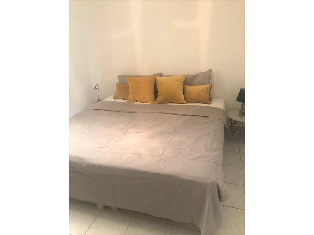 Large double bed in the bedroom which can be made into 2 single beds